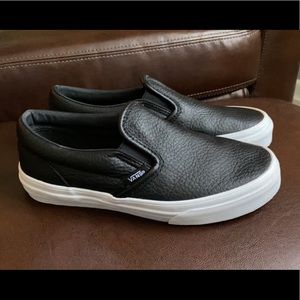 Kids black leather Vans. Barely worn.